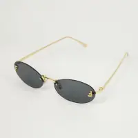 Женские солнцезащитные очки Fendi овальной формы — фото 2