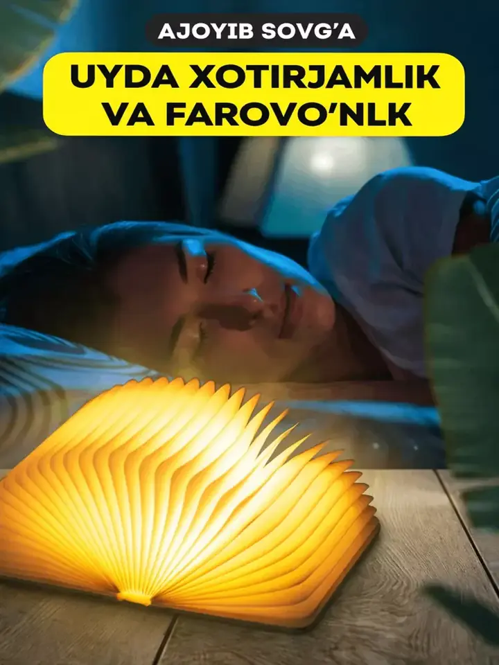 Stol ustiga qo‘yilgan kitob chiroq